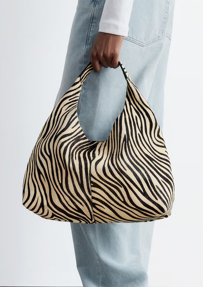 The Iconic & Other Stories Cow-Hair Leather Tote $299