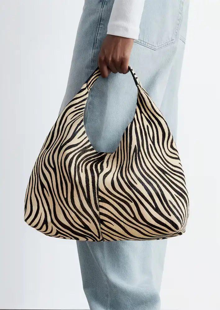 The Iconic & Other Stories Cow-Hair Leather Tote $299