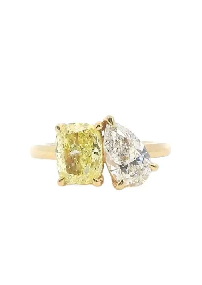 Parker Diamonds Yellow Elongated Cushion and Pear in the Toi et Moi Design POA