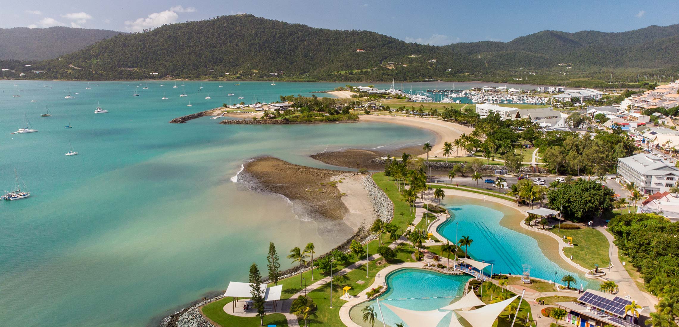 travel to airlie beach from melbourne