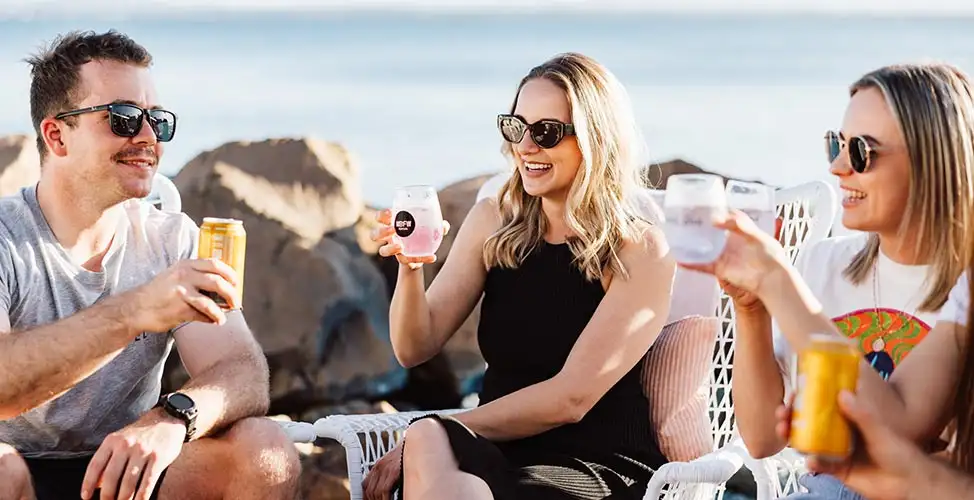 Three friends drinking wine