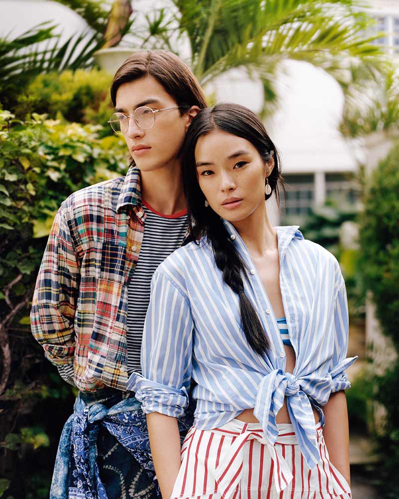 Two models dressed in Ralph Lauren posing for a shoot