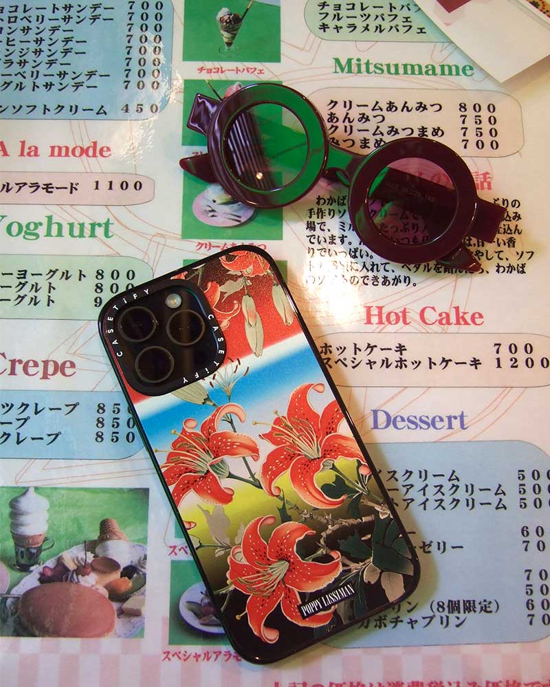 Casetify phone case, sunglasses, tokyo menu flat lay